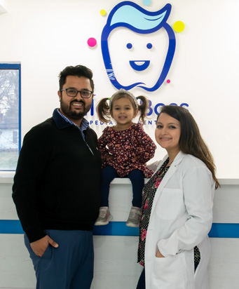 happy father and daughter with floss boss doctor